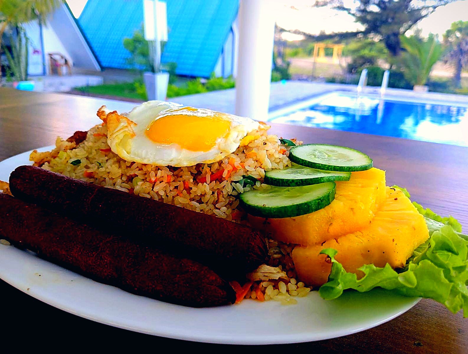 Fried rice with sausage, egg and fresh pineapple