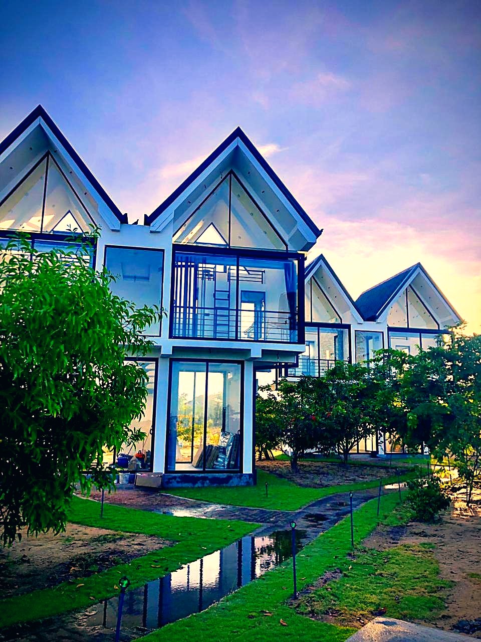 A-frame villas among the palms
